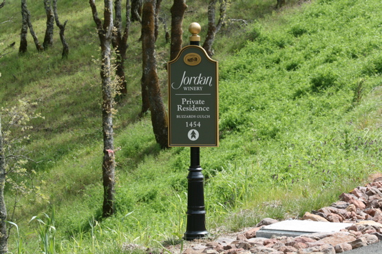 Jordan Winery aluminum & urathane directional all painted with an automotive finish on custom base with finial.  All lettering is white reflective