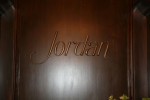 3-D carved urathane letters 

sprayed with "cold bronze" and patinaed.