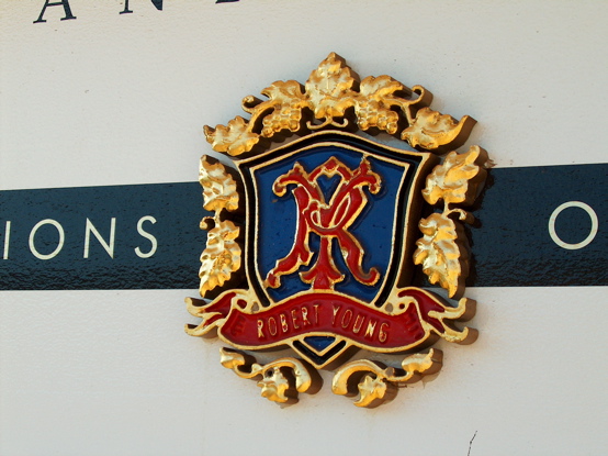 3d urathane carved crest with 23k gold leaf and enamels
