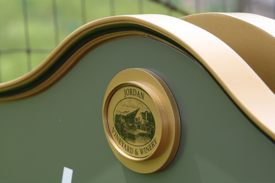 Aluminum face mounted to a 3d carved urathane frame.  The 

aluminum oval icon is machined from a single chunk of aluminum, and has a digital print applied.  Everything is painted with automotive 

paints